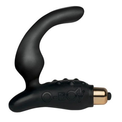 Produto preto com inscrição O-BOY e componente dourado