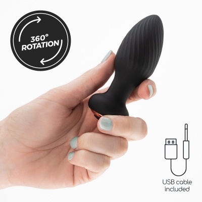 Objeto preto texturizado em silicone com cabo USB e mão segurando