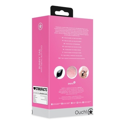 Embalagem rosa e branca com plugue anal metálico e cauda de coelho cor de rosa