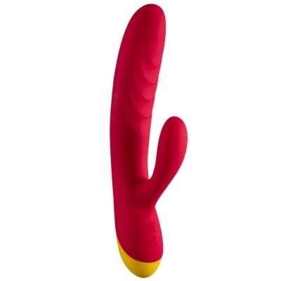 Vibrador vermelho com base amarela e textura ondulada