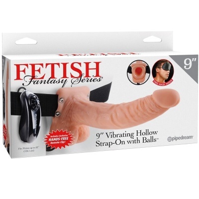Prótese vibratória oca de silicone com cinta ajustável e controlo remoto em embalagem branca da série FETISH Fantasy.