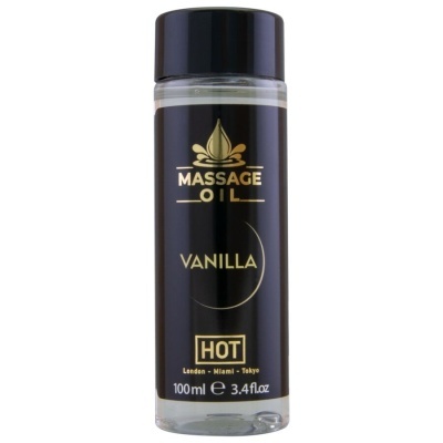 Frasco de óleo de massagem vanilla com rótulo preto e texto dourado