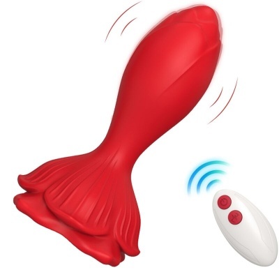 Produto vermelho em forma de cauda de peixe com controlo remoto branco