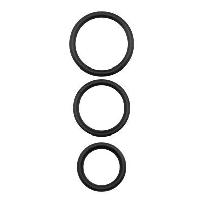 Três anéis pretos de silicone de tamanhos diferentes num fundo branco