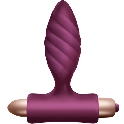 Objeto roxo com textura em espiral e detalhes dourados
