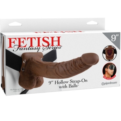 Strap-on oco castanho com correias pretas na embalagem branca da série Fetish Fantasy.