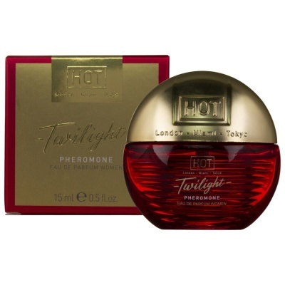 Frasco de perfume vermelho e dourado com caixa dourada e vermelha