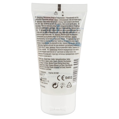 frasco plástico branco com texto multilingue do gel lubrificante médico