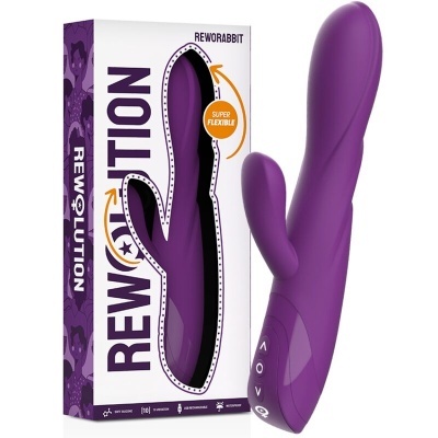 Vibrador roxo de silicone com dois ramos e embalagem branca e roxa ao lado