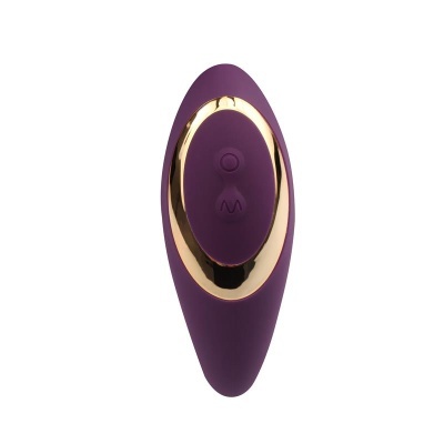 Dispositivo eletrônico oval roxo com detalhes dourados e botões