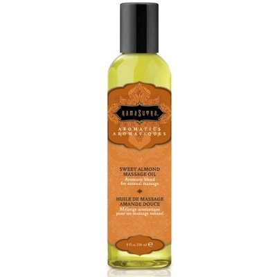 Frasco de óleo de massagem Kamasutra Sweet Almond com etiqueta laranja.