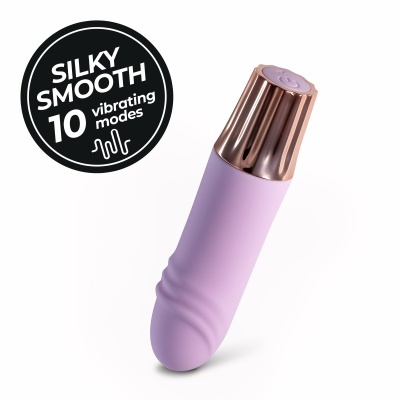 Produto roxo com tampa dourada e botão no topo, sobre fundo branco com texto promocional