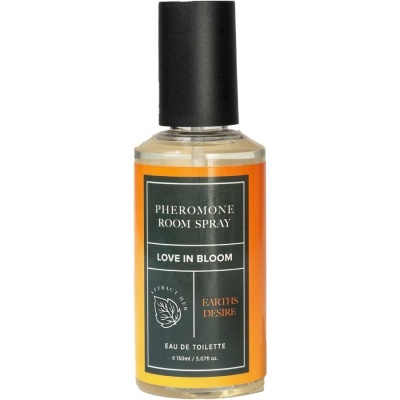 Frasco de spray para ambiente com rótulo laranja e preto