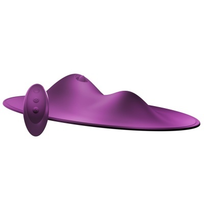 Tapete ou almofada roxa com relevo e controle remoto roxo