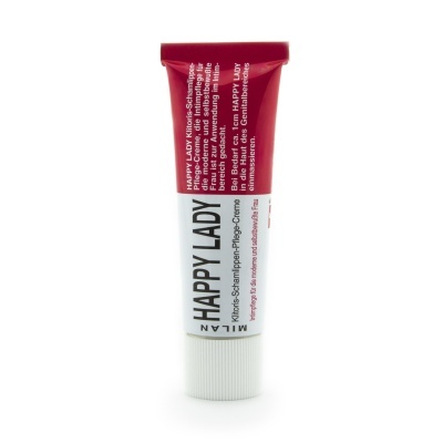 Tubo de creme vermelho e branco com texto em alemão