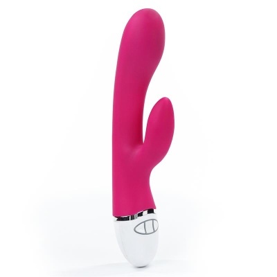 Vibrador rosa com base branca e botões de controlo