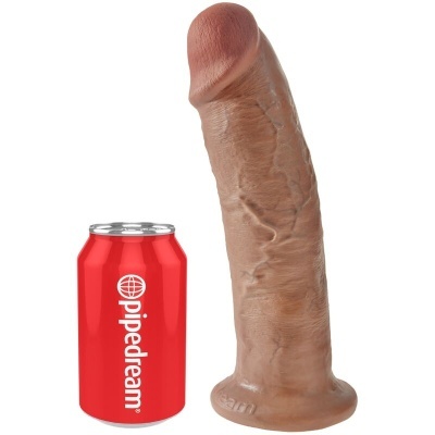 dildo realista castanho com textura junto a uma lata vermelha pipedream