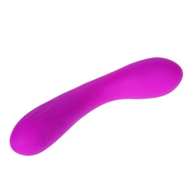 Vibrador cor-de-rosa em silicone liso com botões gravados.