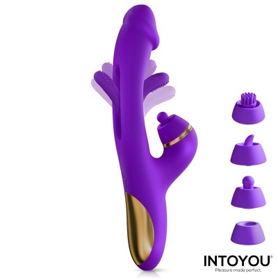 Vibrador roxo com detalhes dourados e quatro cabeças intercambiáveis