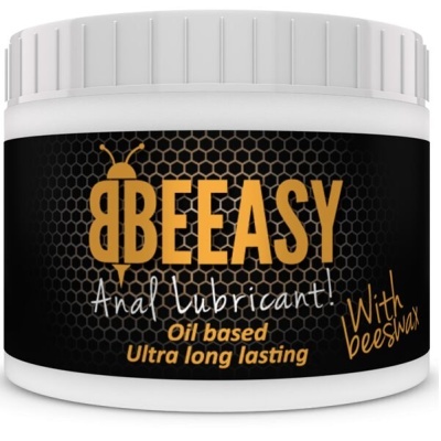 Frasco branco com rótulo preto e amarelo de lubrificante anal à base de óleo