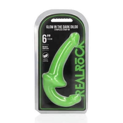 Dildo verde fosforescente em embalagem preta com texto branco e verde