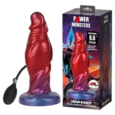 Dildo vermelho com base azul translúcida e dispositivo de inflação preto, caixa ao lado com texto POWER MONSTERS.