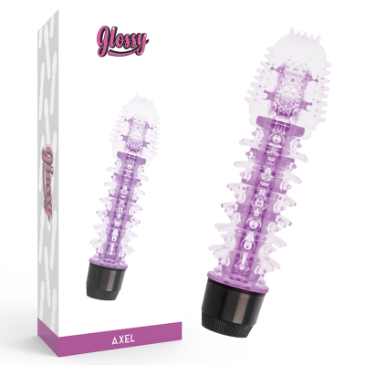 Vibrador roxo translúcido com textura e base preta ao lado da caixa branca com o nome Glossy e AXEL