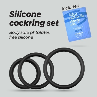 Conjunto de cockrings pretos de silicone com pacote de lubrificante azul.