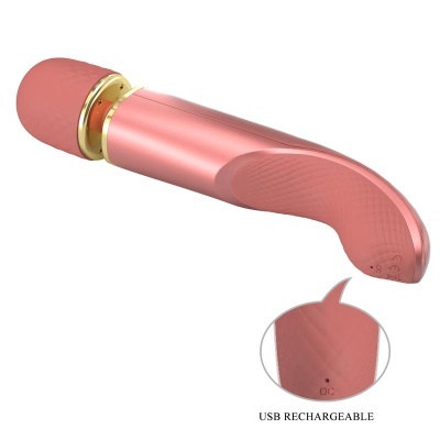 Vibrador cor de rosa com acessórios dourados e textura em relevo