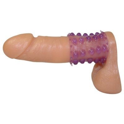 Modelo anatómico de pênis com anel de silicone roxo texturizado na base