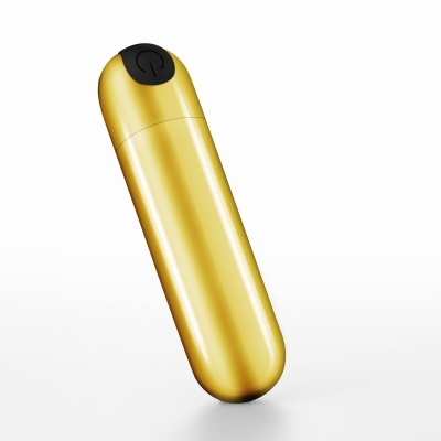 Dispositivo dourado com botão preto e símbolo de ligar.