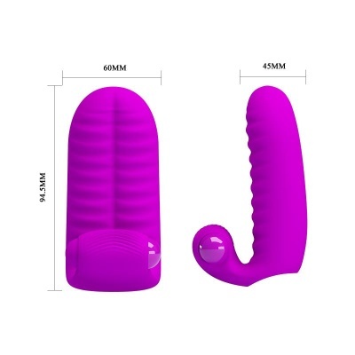Acessório em silicone lilás com texturas e botão, medindo 94,5mm x 60mm x 45mm.
