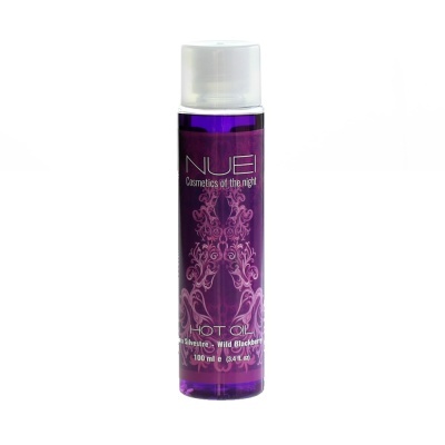 Frasco roxo de óleo cosmético com rótulo decorativo e texto branco