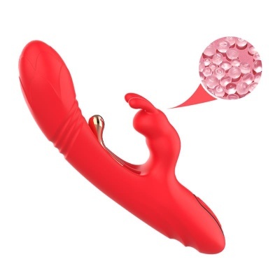 Vibrador vermelho em silicone com detalhes dourados e textura
