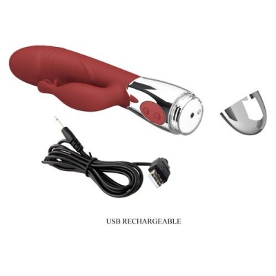 Vibrador vermelho com cabo USB para recarregar e tampa metálica removida