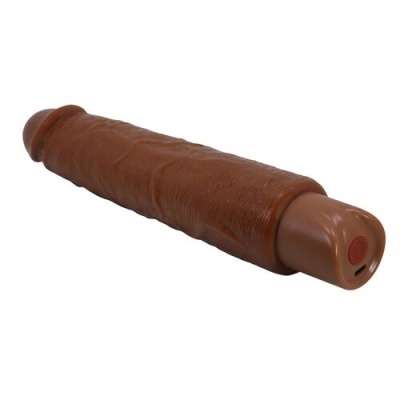 Objeto cilíndrico castanho com base plástica castanha clara e botão vermelho