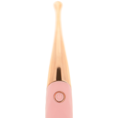 Aparelho eletrónico cor de rosa com detalhe dourado e botão de energia