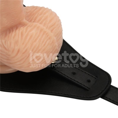 produto simulado cor de pele texturizado fixado a correia preta sintética com fivela