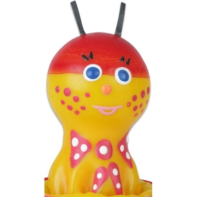 Brinquedo polvo amarelo e vermelho com olhos azuis grandes