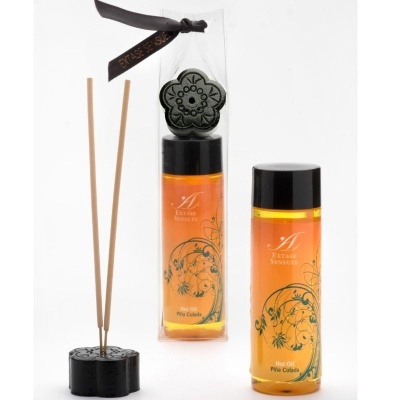 Frascos de óleo quente e suporte decorativo preto com palitos de madeira