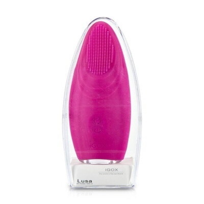 Escova de limpeza facial rosa em embalagem transparente