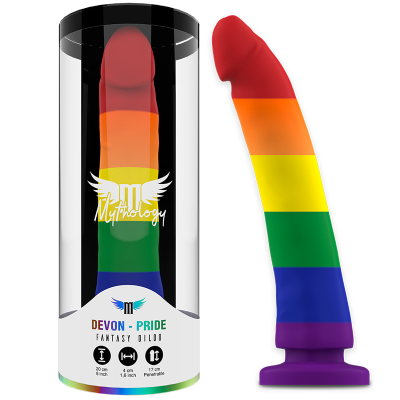 Dildo colorido com base larga e embalagem cilíndrica transparente.