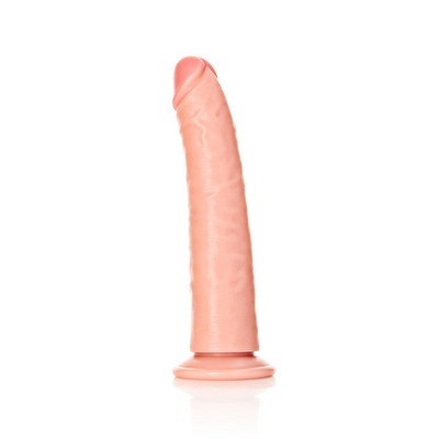 Dildo realista cor de pele com base redonda sobre fundo branco