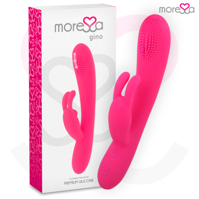 Vibrador rosa em silicone com duas extensões e textura, ao lado da caixa branco e rosa da marca moresa
