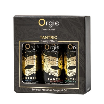 Conjunto Orgie TANTRIC com três óleos de massagem vegetal em embalagem preta com dourado.