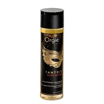 Frasco transparente com tampa preta e rótulo preto dourado e vermelho óleo para massagem