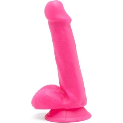 Dildo cor-de-rosa de silicone com base de ventosa em fundo branco.