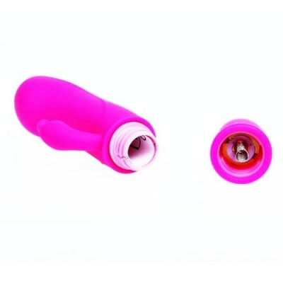 Vibrador rosa em silicone com tampa removível mostrando interior