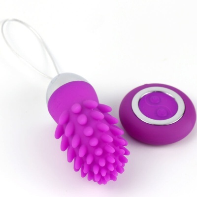 Vibrador roxo com textura e comando remoto