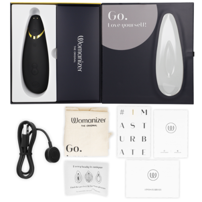 Conjunto Womanizer The Original com aparelho preto e dourado e acessórios